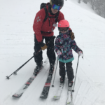 Dr. Carey Skiing with his daughter