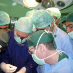 Dr. Carey Operating on a Patient 5