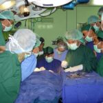 Dr. Carey Operating on a Patient 4