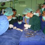 Dr. Carey Operating on a Patient 3