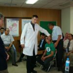 Dr. Carey and a teenager patient
